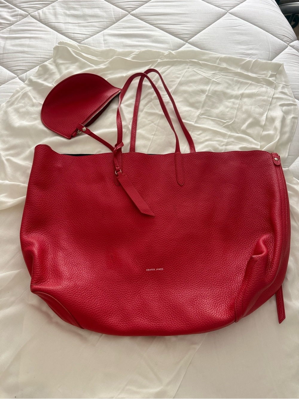 Draper, James reversible, red pebble leather navy suede interior tow bag w/dust